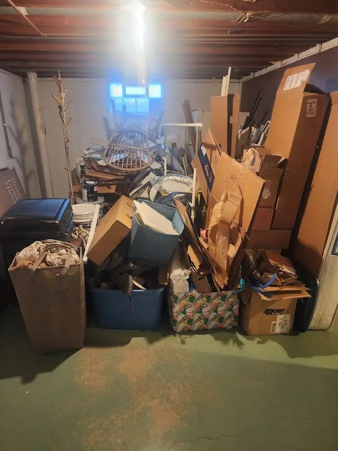 Roll-off dumpster container at job site for Yard Waste Dumpster Rental in Tontitown